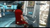 a man in a red shirt is sitting in front of a slot machine that says slot machines