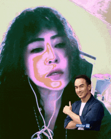 a man giving a thumbs up in front of a woman 's face with a purple face