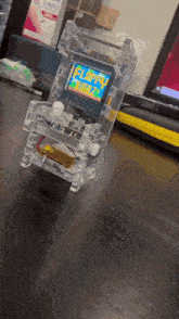 a small electronic device with a screen that says " happy jazz "