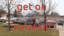 a sign that says " get on valorant " in red