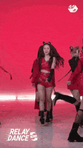 a group of girls are performing a dance and the words relay dance are on the bottom