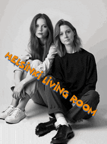 two women sitting next to each other with the words helsinki living room written on the bottom
