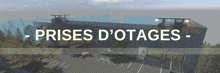 a large building with the words " prises d' otages " written above it