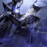 a couple of people are dancing in a dark room .