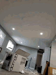 a kitchen with a box on the counter that says ' fragile '