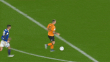 a soccer player with the number 43 on his jersey stands near the goal