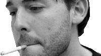 a man is smoking a cigarette in a black and white photo