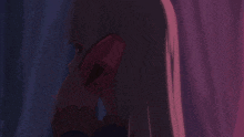 a woman with long white hair is holding a red object in her hand