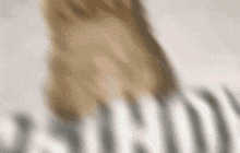 a close up of a person 's hand on a keyboard with the letters t and h visible
