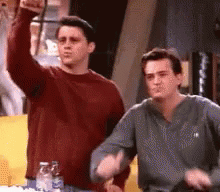 Joey and Chandler with thumbs up
