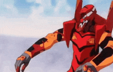 a red and yellow robot is standing in the air with its arms outstretched .