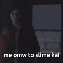 a person standing in front of a window with the words me omw to slime kai on the bottom