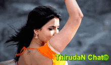 a woman 's arm is visible in front of a banner that says thiruda chat