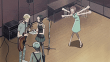 a woman in a green dress stands in front of a group of people playing instruments