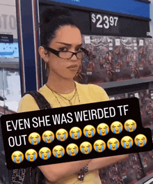 a woman wearing glasses is holding a sign that says even she was weirded tf out