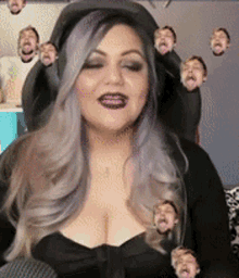 a woman with purple hair and a hat is surrounded by many faces