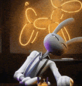 a cartoon rabbit is sitting at a table with a glass of whiskey ..