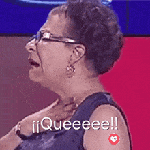 an older woman wearing glasses and earrings is making a funny face and saying queeeee !!
