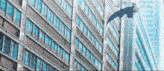 a bat is flying over a tall building