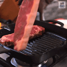 Putting The Meat In The Pan Food Box Hq GIF - Putting The Meat In The Pan Food Box Hq Cooking Steak GIFs