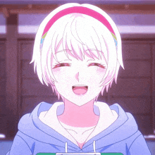 a girl with white hair and a pink headband smiles