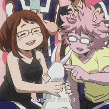 a group of anime characters are posing for a picture and one of them is holding a rabbit