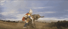 a cartoon character is fighting a monster in the desert .
