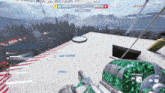a screenshot of a video game shows a person holding a gun with a green camouflage on it