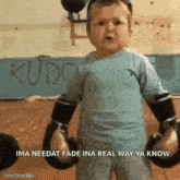 a baby is wearing boxing gloves and says ima needat fade in a real way ya know