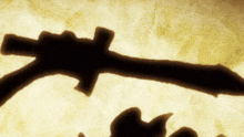 a shadow of a sword is cast on a brown background
