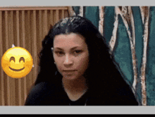 a woman with a smiley face on her face