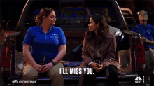 two women are sitting in the back of a truck and one says i 'll miss you