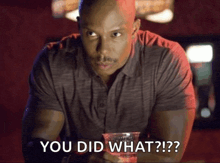 a man sitting at a bar with a drink in his hand and the words " you did what " written on the bottom