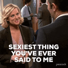 a woman is talking to a man with the words sexiest thing you 've ever said to me behind her