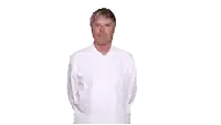 a man in a white shirt is making a funny face