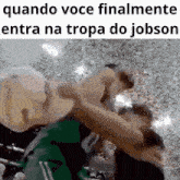 a meme of two men fighting with the caption quando voce finalmente entra na troca do jobso