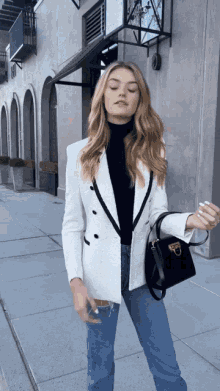 Willow Hand White Suit GIF - Willow Hand White Suit Purse GIFs