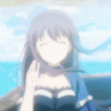 a blurry picture of a girl with purple hair giving a peace sign