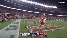 a football game is being played between the 49ers and the cowboys