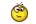 a pixelated smiley face is holding a torch and a candle .