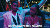 a man and a woman are sitting on a ferris wheel and the woman says you 've always been amazing