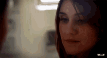 a close up of a woman 's face with the words rbd.gif below