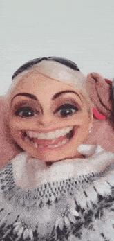 a woman is making a funny face with her mouth open