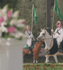 a man riding a horse with a green flag in his hand