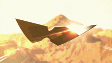 a plane is flying through the air with the sun shining through it