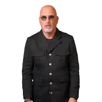 a bald man wearing sunglasses and a black jacket is standing with his arms outstretched