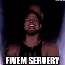 a man with a beard is laughing with the words fivem servery on his face .