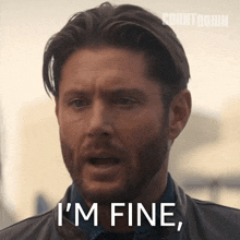 a man with a beard says " i 'm fine " in front of a countdown logo
