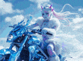 a picture of a woman riding a blue motorcycle with the words hello hollow in the lower right corner