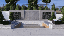 a brick wall with a waterfall and a fire pit in front of it